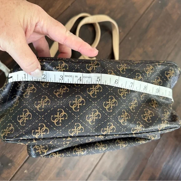 GUESS Monogram Leather Backpack in Brown and Tan - Picture 2 of 16